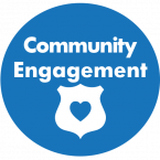 blue circle; white text - community engagement; white badge icon with blue heart in the middle